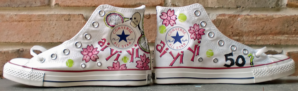 custom painted chucks in a tennis and skullie theme painted custom chuck taylor hi tops pink green tennis skull
