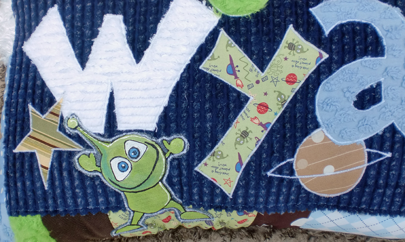 detail of painted alien applique