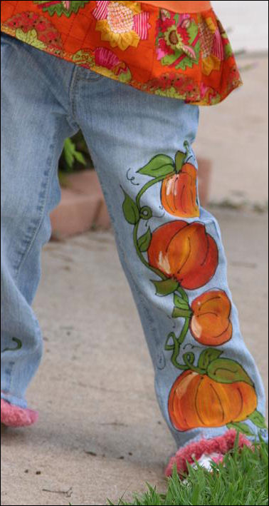 Painted orange pumpkin jeans for fall mfor little girls
