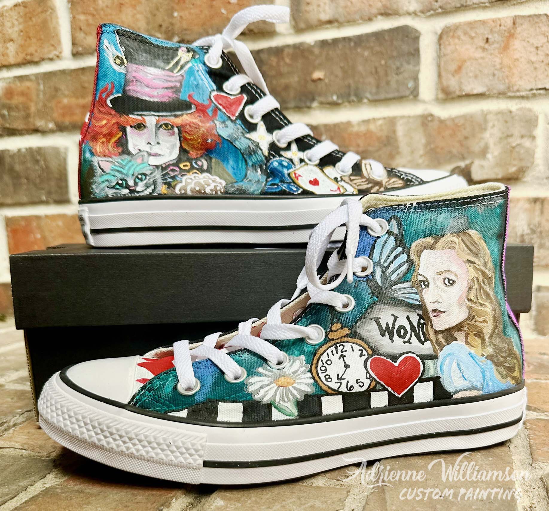 A pair of Converse painted in Alice in Wonderland Theme