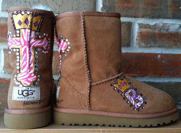 pink zebra painted cross on an ugg boot