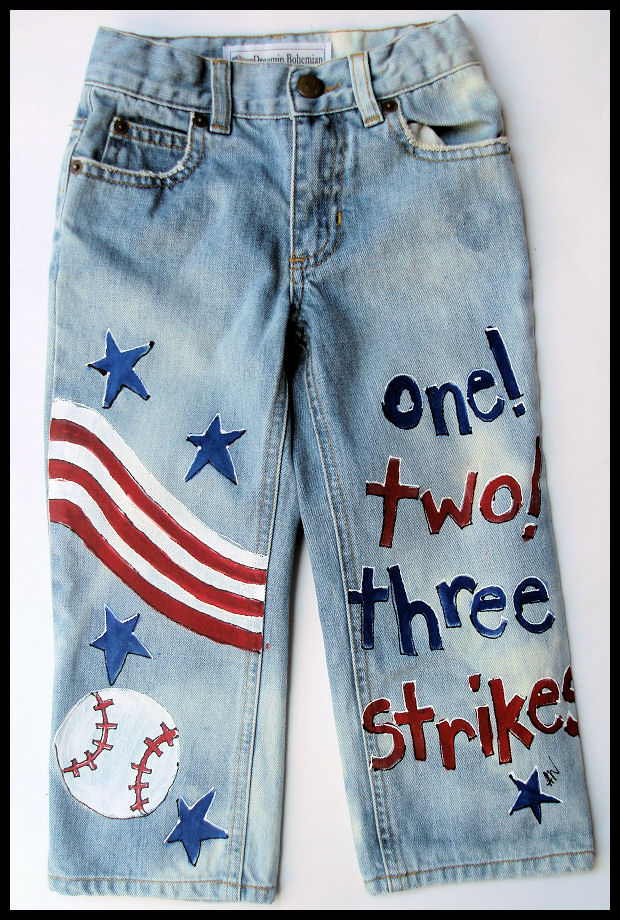Adorable hand painted jeans with a baseball theme for boys.