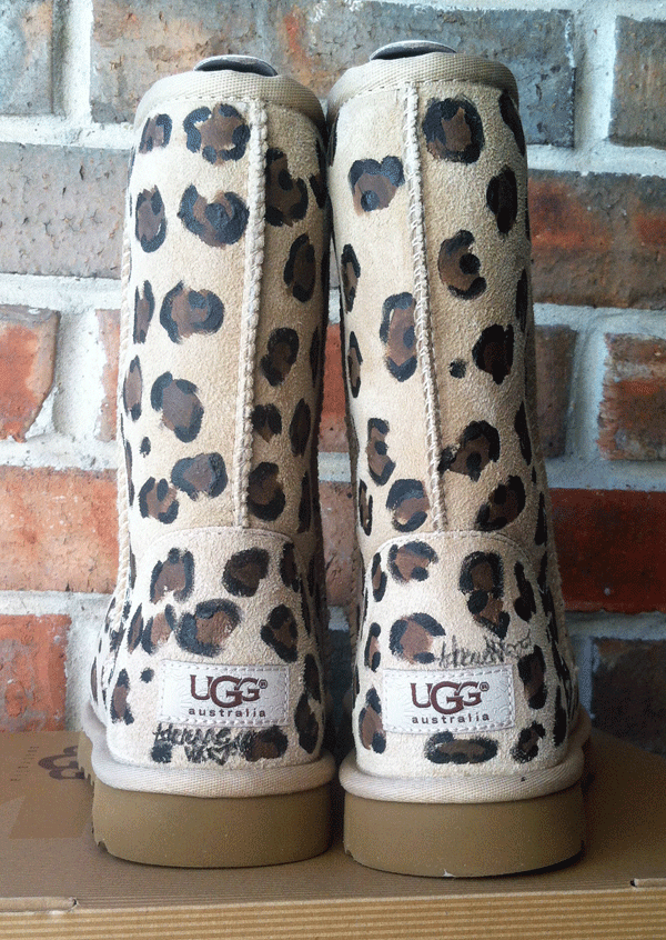 the back side of sand colored ugg boots painted with leopard print