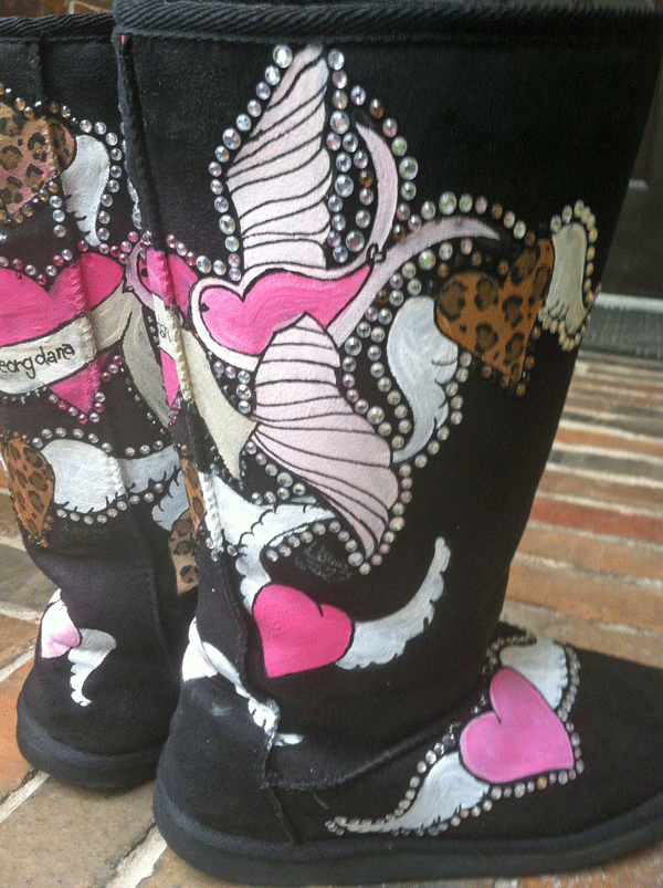 hand painted ugg boots with lovebirds holding a banner personalized with names and hearts with wings flying all over