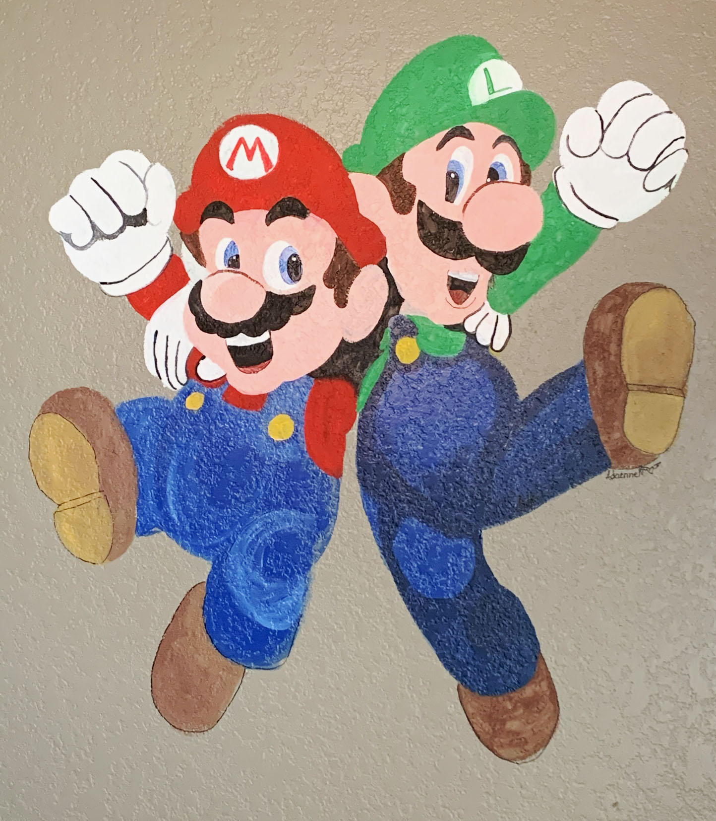 a mural of Mario and Luigi painted in a boys bedroom