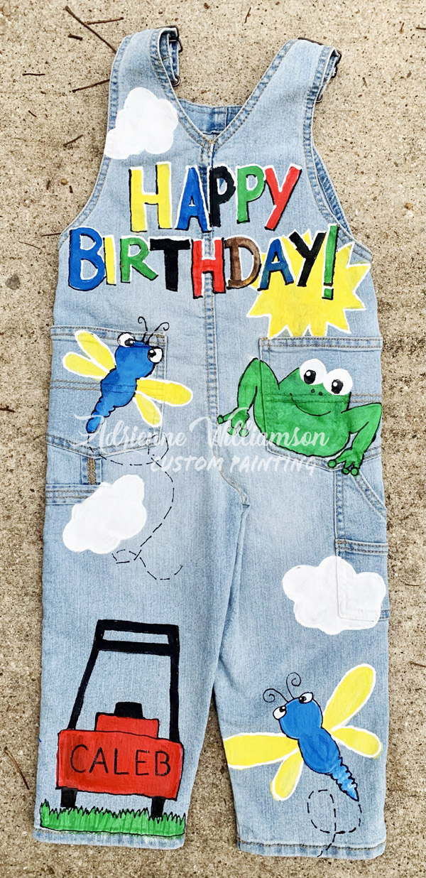 happy birthday painted on overalls with garden tools