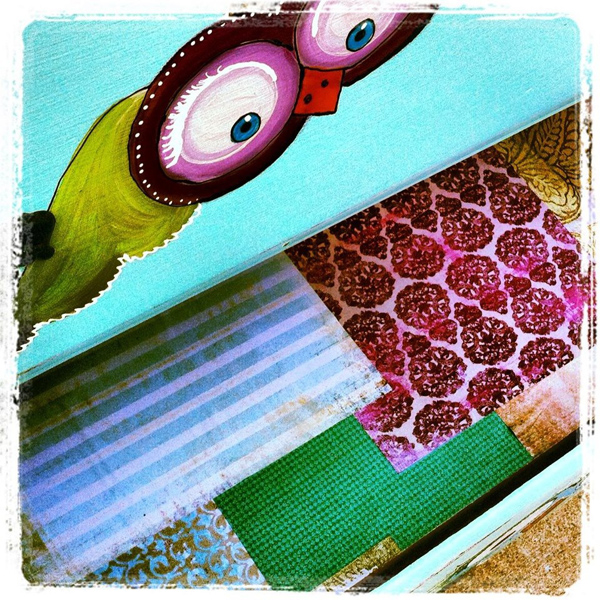 Inside drawers of a hand painted aqua chest of drawers with owls