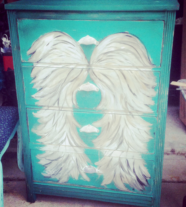 Hand painted dresser with Angel Wings on a Aqua Background